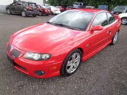 Image result for Bright Red 2004 Pontiac