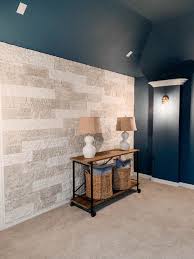 Follow this simple step by step guide, which includes tips and tricks and a variety of design options! How To Build A Faux Stone Wall Faux Stone Walls Diy Stone Wall Interior Stone Walls Interior