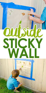 Outside Sticky Wall Busy Toddler Fun Outdoor Activities Toddler Activities Toddler Outdoor