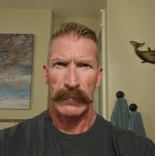 Tigana by Guy Gavriel Kay. Wonderful use of language. Great turn of phrase.  Prose to learn from. There's even a decent plot, sadly its hidden in a  baggy overblown narrative. You could