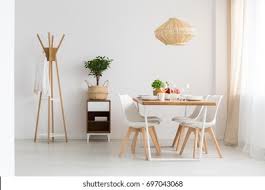 Explore our store for iconic furniture reflecting the modern works of arne jacobsen, hans wegner, and other norwegian and scandinavian designers. Simple Stylish Scandinavian Dining Room Minimalist Stock Photo Edit Now 697043068