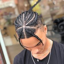 Braid hairstyles for men date back millennia, but they are also one of the most modern haircuts you can rock. 11 Awesome Man Bun Hairstyles With A Fade Man Bun Hairstyles Mens Braids Hairstyles Hair Styles