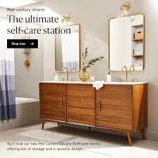 At this modern farmhouse in texas, the double marble sink is from restoration hardware while the rug is from west elm. West Elm New Obsession Our Mid Century Double Bathroom Vanity Milled