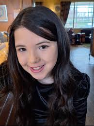 Can someone edit a photo of my dog walking alongside her friend as an angel?