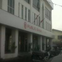 The square has a water feature. Public Bank Jalan Kebun Sultan