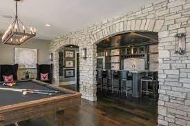Stone Wall Bar And Game Room Basement Remodeling Game Room Bar Basement Bar Designs