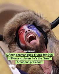 The QAnon shaman has sued @realdonaldtrump for $40 trillion in a rambling  lawsuit that targets Elon Musk, T-Mobile, and Warner Bros. Jacob Chansley,  infamous for wearing a horned warrior outfit while storming