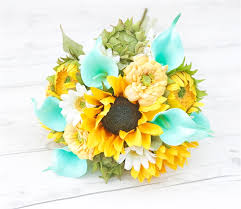 This bouquet features artificial sunflowers with roses and orchids. Sunflower Yellow And Aqua Calla Lilies Real Touch Silk Wedding Bouquet