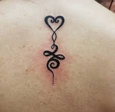 40 Inspiring Tattoo Ideas To Get After A Divorce Tattoos Love Symbol Tattoos Inspirational Tattoos