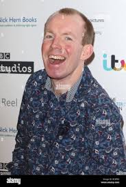 Lee Ridley aka Lost Voice Guy at the Writers Guild Awards 2019 at The Royal  College of Physicians, St Andrews Place, Regent's Park Stock Photo