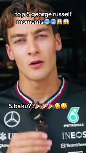 George Russell Laughing