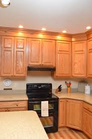 Haas Cabinetry Wood Species Oak Cabinet Finish Honey Door Style Estate Square Countertop Solid Surface Hi Macs Brand S Oak Cabinets Countertops Cabinetry