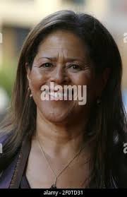 Sidney Harman, center