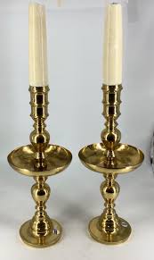 These tiered candle holder displays are all over home decor magazines and pop up constantly on i've caught myself repinning plenty of these images because the displays just look soo good. Lot 2 Oversized Brass Candle Holders With Candles 33 1 2 Tall