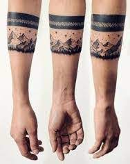 The tattoo is made to appear as if one is wearing a bracelet on their hand. What Does Armband Tattoo Mean Represent Symbolism