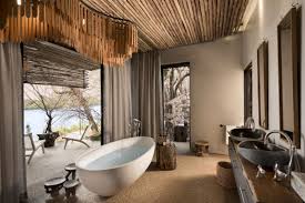 This curtain's fabric and color should go with the safari style adding more beauty and function to your bathroom. 7 Luxurious Outdoor Safari Bathrooms With Wilderness Views Sun Safaris Travel Blog