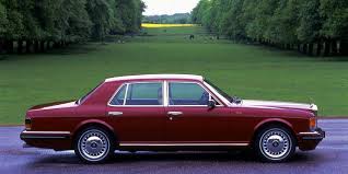 Photo presents on old fashioned car in the red colour, with red chrome rims and bumpers, small. 28 Cheap Luxury Cars Greatest Affordable Used Luxury Cars