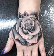 Dove tattoos are usually tributes to someone who has passed away. Westend Tattoo Wien Wien Tattoo Tattoo Rose Tattoo Black And Grey Rose Tattoo Hand Tattoo Tatouage Rose Sur Main Tatouage Rose Tatouage Rose Homme