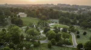 Why jfk's grave has an eternal flame. Arlington House And John F Kennedy Gravesite At Arlington National Cemetery Virginia Twilight Aerial Stock Photo