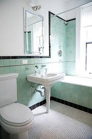 Crisis In The Commode Powder Room Edition Remodelista Retro Bathrooms Green Bathroom Black Tile Bathrooms