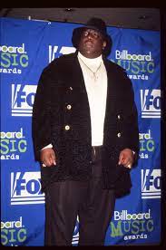 Maybe you would like to learn more about one of these? Notorious Big S Son Cj Looks Just Like His Dad Posing In Front Of A Huge Mural Of The Rapper