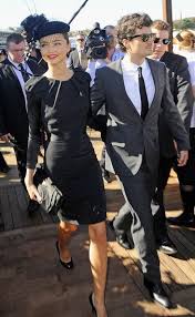 Miranda Kerr And Orlando Bloom At Derby Day Dress Code For Derby Day Races Is Black And White Derby Day Fashion Derby Outfits Race Day Outfits