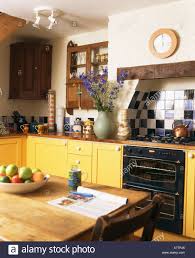 pine table in cottage kitchen with