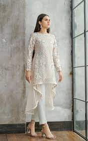 Dresses that compliment your style, elevate your lifestyle and steal the spotlight? Front And Sleeves Net Embroidered Tail Style Shirt With Embroidered Yoke At Back And Pearls Embelli Fashion Dresses Dress Indian Style Pakistani Formal Dresses