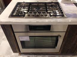 I see the oven under cooktop almost everywhere yet i've found that neither my cabinet designer, nor the cabinetry company can accommodate the cutout. Pin On Living Room Kitchen Remodel