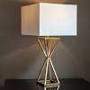 This table lamp set has just the right combination of blue and brown hues to create a coastal farmhouse accent on your end tables or nightstands. 1