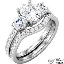 Oval And Round 3 Stone Engagement Ring With Channel Set Accent Diamonds And Matching Curve Top 10 Engagement Rings Engagement Rings Semi Mount Engagement Rings