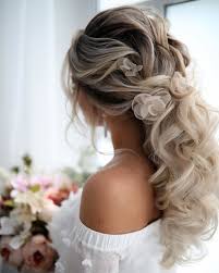 Pin a bridal hair comb filled with pastel florals on top of your loose bun for a romantic, bohemian vibe. Mother Of The Bride Hairstyles 63 Elegant Ideas 2021 Guide