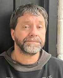 Police say murder suspect shot into car with 8-year-old girl inside