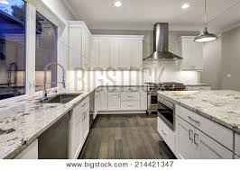 We did not find results for: Large Spacious Kitchen Design With White Kitchen Cabinets White Kitchen Island With Lots Of Storage White Granite Countertops Subway Tiles And Stainless Steel Appliances Northwest Usa Northwest Usa Poster Id 214421347