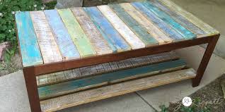 Keeping in mind the huge cost of wooden furniture, you can use discarded wooden pallets for designing a sturdy coffee table without burning a hole in your pocket. Remodelaholic Update A Glass Top Coffee Table With A Pallet