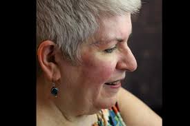 Bernotas Middle School special education teacher Cathy Mattoon meets with  her summer school class from home using Google Meet