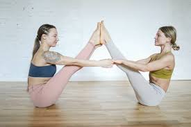 From a seated position facing each other, extend legs out exhale as one person folds forward from the hips and the other sits back, keeping the spine and arms straight. Best Yoga Challenge Poses For 2 All Asana With Video Going Fit Unfit
