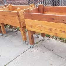 Wood raised garden bed fill this planter's bed with up to 2 bags fill this planter's bed with up to 2 bags of soil and protect plants from drowning with drainage on each end. Easy Raised Garden Bed On Casters For Patio Or Deck 11 Steps With Pictures Instructables