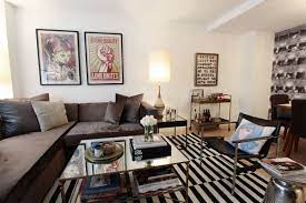 Your coffee table should be no more than 4″ higher or shorter than the top of your sofa seat cushions. The Ultimate Decorators Guide To Ideal Living Room Layout Measurements Apartment Therapy