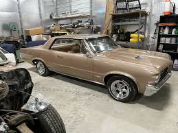 Image result for Saddle Bronze 1964 Tempest