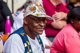 New Albany native dons all 36 Harvest Homecoming pins