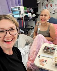 Just days after a routine blood test, 27-year-old Beth Gilmore was told  that she had acute myeloid leukaemia (AML) and was stretchered onto a plane  bound for Brisbane for emergency treatment –