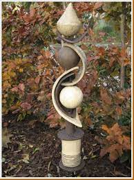 Bedpost Garden Art Google Search Garden Art Garden Pottery Pottery Sculpture