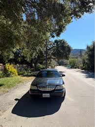 Image result for Charcoal Green 1998 Town Car
