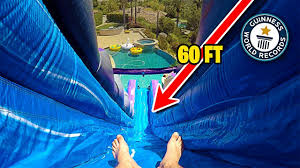 Today we are playing with this crazy water slide in our backyard with my little brother. World Record Biggest Backyard Water Slide Ever Youtube