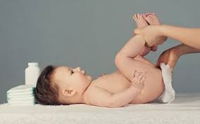 His face is not visible in the photos, but you can clearly see his feet and diaper. How To Change A Nappy Hse Ie