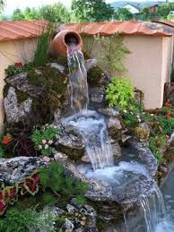 Den Garten Verschonern Und Nach Feng Shui Gestalten Garten Gestalten Feng Shui Fallendes Wasser The Post Den Garten Wasserfall Garten Garten Gestalten Garten
