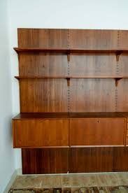 Never miss new arrivals matching exactly what you're looking for! Large Mid Century Design Nutwood Poul Cadovius Wall Unit Denmark 1960s Hpvintage Com