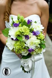 Festive wedding bouquet with free spirit rose, pink peony, dark purple thistle, red madrona, yellow billy bobs, white lysianthus, explosion grass, silver dollar, and hosta leaves. 39 Best Purple And Lime Green Wedding Theme Ideas Lime Green Weddings Wedding Green Wedding