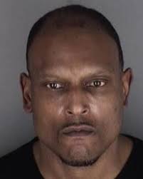 Man arrested after threatening Topeka officers with ax